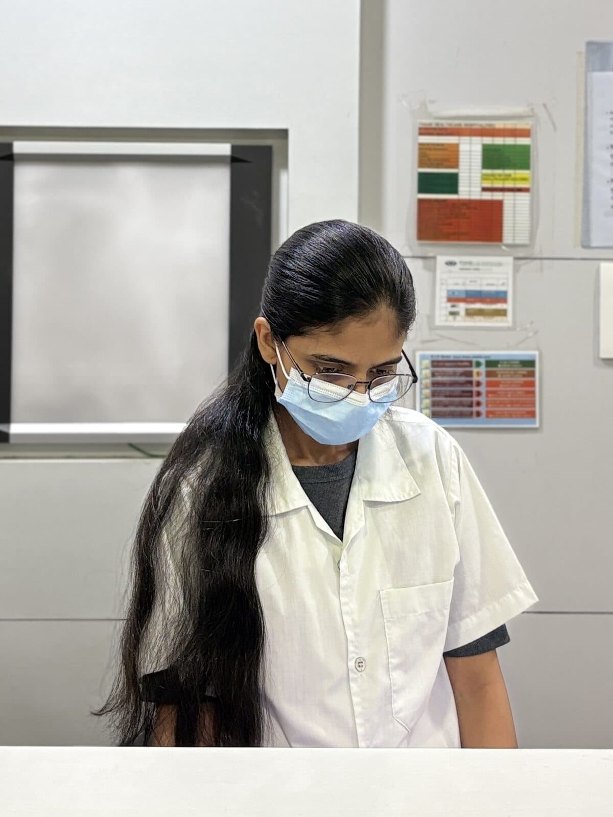 A THC staff member at the front desk